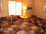 Lower level bedrom 5 with queen bed and twin bed